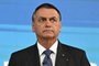 Brazilian President and reelection candidate for the Liberal Party (PL) Jair Bolsonaro gestures before the start of the television debate at the Globo TV studio in Rio de Janeiro, Brazil, on October 28, 2022. - After a bitterly divisive campaign and inconclusive first-round vote, Brazil will elect its next president on October 30, in a cliffhanger runoff between far-right incumbent Jair Bolsonaro and veteran leftist Luiz Inacio Lula da Silva. (Photo by MAURO PIMENTEL / AFP)Editoria: POLLocal: Rio de JaneiroIndexador: MAURO PIMENTELSecao: electionFonte: AFPFotógrafo: STF<!-- NICAID(15249315) -->