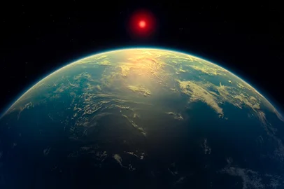 A handout artist's impression released on April 17, 2025 by N. Madhusudhan/University of Cambridge, shows the K2-18b super-Earth, a hycean world, such as exoplanet K2-18b which astronomers say they have found the strongest yet hints of the life outside this solar system. Astronomers announced on April 17, 2025 they have detected the most promising "hints" yet of potential life on a planet beyond our solar system, though other scientists expressed scepticism. There has been vigorous debate in scientific circles about whether the planet K2-18b, which is 124 light years away in the Leo constellation, could be an ocean world capable of hosting microbial life. (Photo by Handout / University of Cambridge / AFP) / RESTRICTED TO EDITORIAL USE - MANDATORY CREDIT "AFP PHOTO /  University of Cambridge  / N. Madhusudhan" - HANDOUT - NO MARKETING NO ADVERTISING CAMPAIGNS - DISTRIBUTED AS A SERVICE TO CLIENTS<!-- NICAID(16018778) -->