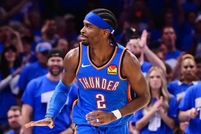 OKLAHOMA CITY, OKLAHOMA - MAY 18: Shai Gilgeous-Alexander #2 of the Oklahoma City Thunder reacts after scoring during the fourth quarter of a game against the Denver Nuggets in Game Seven of the Western Conference Second Round NBA Playoffs at Paycom Center on May 18, 2025 in Oklahoma City, Oklahoma. NOTE TO :  expressly acknowledges and agrees that, by ing and or using this photograph,  is consenting to the  and conditions of the Getty Images License Agreement.   Joshua Gateley/Getty Images/AFP (Photo by Joshua Gateley / GETTY IMAGES NORTH AMERICA / Getty Images via AFP)<!-- NICAID(16040571) -->
