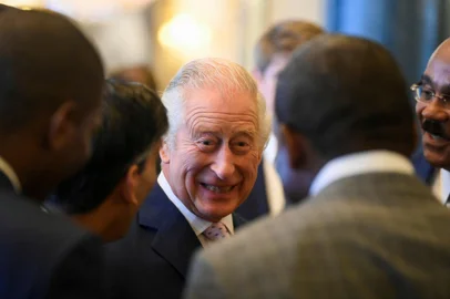 Britain's King Charles III speaks with guests during a Realm Governors General and Prime Ministers Lunch, at Buckingham Palace in London on May 5, 2023, ahead of the coronation weekend. (Photo by TOBY MELVILLE / POOL / AFP)<!-- NICAID(15420783) -->