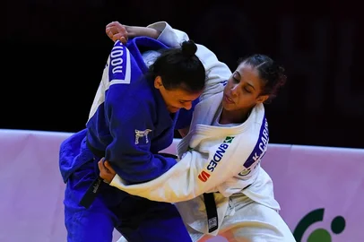 FERENC ISZA / AFP Kaillany Cardoso, tênis