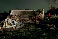 In this still image obtained from the Laurel County Fiscal Court in Kentucky, local residents search through tornado damage in Laurel County near London, Kentucky, on May17, 2025. More than 20 people have died after severe storms swept through the southern US states of Missouri and Kentucky, officials and local media reports said May 17, 2025. Kentucky governor Andy Beshear said on X that at least 14 people had died in Friday night's storms. At least seven people were killed in Missouri, the Washington Post reported. (Photo by Handout / Laurel County Fiscal Court / AFP) / RESTRICTED TO EDITORIAL USE - MANDATORY CREDIT "AFP PHOTO / Laurel County Fiscal Court" - NO MARKETING NO ADVERTISING CAMPAIGNS - DISTRIBUTED AS A SERVICE TO CLIENTS<!-- NICAID(16039659) -->