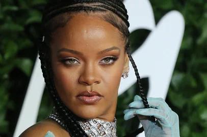 (FILES) In this file photo taken on December 2, 2019 Barbadian singer Rihanna poses on the red carpet upon arrival at The Fashion Awards 2019 in London - Attempting to define a decade in the world of entertainment is, at best, daunting.But hey, we are going to give it a try.Here are some of the key trends that emerged in the 2010s in television, film and music, from the explosion of scripted series to a new generation of divas whose empires transcend the concert stage:- Generation streaming. At the start of 2010, Spotify had less than one million subscribers to its music platform, Netflix had a bit more than 12 million, and streaming services were more of a curiosity than anything else.Ten years on, Spotify has 248 million users and Netflix has more than 158 million. Streaming is now the norm. (Photo by Isabel Infantes / AFP) / RESTRICTED TO EDITORIAL USE -  NO MARKETING NO ADVERTISING CAMPAIGNS<!-- NICAID(14369133) -->