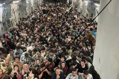 This image distributed Courtesy of the US Air Force shows the inside of Reach 871, a U.S. Air Force C-17 Globemaster III flown from Kabul to Qatar on August 15, 2021. The plane safely evacuated some 640 Afghans from Kabul late Sunday, according to U.S. defense officials contacted by Defense One. - Tens of thousands of people have tried to flee Afghanistan to escape the hardline Islamist rule expected under the Taliban, or fearing direct retribution for siding with the US-backed government that ruled for the past two decades. Evacuation flights from Kabul's airport restarted on Tuesday after chaos the previous day in which huge crowds mobbed the tarmac, with some people so desperate they clung to the outside of a US military plane as it prepared for take-off. (Photo by Capt. Chris Herbert / US Airforce / AFP) / RESTRICTED TO EDITORIAL USE - MANDATORY CREDIT "AFP PHOTO /US AIRFORCE/ Cpt Chris HERBERT " - NO MARKETING - NO ADVERTISING CAMPAIGNS - DISTRIBUTED AS A SERVICE TO CLIENTS<!-- NICAID(14864451) -->