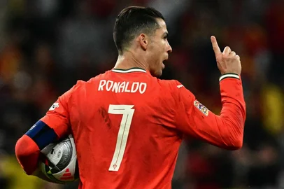 Portugal's forward #07 Cristiano Ronaldo celebrates scoring the 2-2 goal during the UEFA Nations League final football match between Portugal and Spain in Munich, southern  on June 8, 2025. (Photo by Tobias SCHWARZ / AFP)<!-- NICAID(16055204) -->