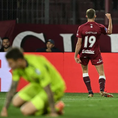 Lanus' midfielder #19 Rodrigo Castillo celebrates scoring his team's first goal during the Copa Sudamericana semifinal second leg football match between Argentina's Lanus and Chile's Universidad de Chile at the Ciudad de Lanus stadium in Lanus, Buenos Aires province, on October 30, 2025. (Photo by Luis ROBAYO / AFP)<!-- NICAID(16157619) -->
