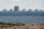 (FILES) In this file photo taken on April 27, 2022 a general view shows the Zaporizhzhia nuclear power plant, situated in the Russian-controlled area of Enerhodar, seen from Nikopol. Zelensky calls on the United Nations on August 18, 2022 to ensure security at the Zaporizhzhia power plant, where increased fighting has raised fears of a nuclear incident. (Photo by Ed JONES / AFP)Editoria: ENVLocal: Nikopol'Indexador: ED JONESSecao: energy and resourceFonte: AFPFotógrafo: STF<!-- NICAID(15187446) -->