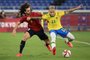 Spain's Marc Cucurella (L) and Brazil's Antony vie for the ball during the Tokyo 2020 Olympic Games football competition men's gold medal match at Yokohama International Stadium in Yokohama, Japan, on August 7, 2021. (Photo by Anne-Christine POUJOULAT / AFP)Editoria: SPOLocal: YokohamaIndexador: ANNE-CHRISTINE POUJOULATSecao: soccerFonte: AFPFotógrafo: STF<!-- NICAID(14857025) -->