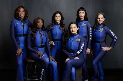 This handout photograph released on April 14, 2025 by Blue Origin, shows (from L) US TV personality Gayle King, Bahamian-US former NASA scientist Aisha Bowe, US journalist Lauren Sanchez, US research scientist Amanda Nguyen, US singer Katy Perry and US film producer Kerianne Flynn posing in their space suits at an undisclosed location ahead of the all-woman sub-orbital mission aboard the company's New Shepard rocket. Pop star Katy Perry will be the biggest name in an all-woman group set to touch the edge of space on April 14, 2025, roaring into the cosmos on one of billionaire Jeff Bezos's rockets. The "Firework" and "California Gurls" singer will be lofted more than 100 kilometers (60 miles) above the Earth's surface in a vessel from Blue Origin, the space company owned by the Amazon founder. Five other women including Bezos's fiancee Lauren Sanchez will join the flight, slated to blast off from western Texas at around 8:30 am (1330 GMT). (Photo by Handout / BLUE ORIGIN / AFP) / RESTRICTED TO EDITORIAL USE - MANDATORY CREDIT "AFP PHOTO / BLUE ORIGIN / HANDOUT" - NO MARKETING NO ADVERTISING CAMPAIGNS - DISTRIBUTED AS A SERVICE TO CLIENTS<!-- NICAID(16016409) -->