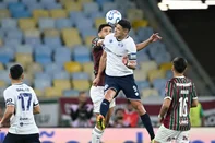 Fluminense's defender #04 Ignacio and Independiente Rivadavia's Paraguayan forward #9 Alex Arce jump for a header during the first leg of the Copa Libertadores round of 16 football match between Brazil's Fluminense and Argentina's Independiente Rivadavia at the Maracana stadium in Rio de Janeiro, Brazil, on August 11, 2026. (Photo by MAURO PIMENTEL / AFP)<!-- NICAID(16344434) -->