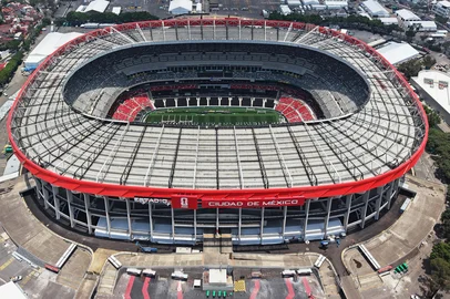 This aerial view shows the Mexico City Stadium, renamed from Azteca Stadium (or Banorte Stadium) for the FIFA World Cup, in Mexico City on May 28, 2026. FIFA temporarily branded the iconic Azteca Stadium as "Mexico City Stadium" for the 2026 World Cup, enforcing a strict "debranding" policy that requires all host stadiums to remove or cover non-official corporate sponsor names, suite branding, and external logos. (Photo by Carl DE SOUZA / AFP)<!-- NICAID(16298776) -->