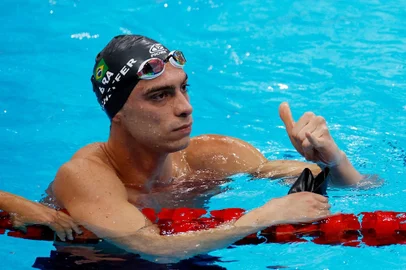 Brazil's Fernando Scheffer competes to win a heat for the men's 200m freestyle swimming event during the Tokyo 2020 Olympic Games at the Tokyo Aquatics Centre in Tokyo on July 25, 2021.