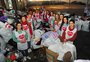 Candidatas ao trio de soberanas da Festa da Uva ajudam em triagem da Campanha do Agasalho em Caxias