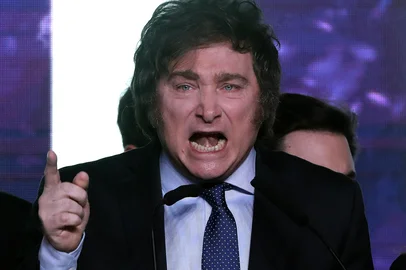Argentine far-right libertarian economist and presidential candidate Javier Milei delivers a speech at his headquarters in Buenos Aires on August 13, 2023. The far-right libertarian economist Javier Milei gets 32.31% of the votes in the primaries for the Argentine presidential election, and becomes the protagonist of this election that will contest the former Security Minister Patricia Bullrich and the Economy Minister Sergio Massa. (Photo by ALEJANDRO PAGNI / AFP)<!-- NICAID(15509434) -->