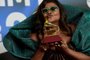 Brazilian singer Gaby Amarantos poses with the trophy after receiving the Best Portuguese Language Roots Album award for her album "TecnoShow" during the 24th Annual Latin Grammy Awards ceremony at the Conference and Exhibition Centre (FIBES) in Sevilla on November 16, 2023. The Annual Latin Grammy Awards ceremony takes place for the first time out of US, gathering the most popular artists of the Latin world at the Conference and Exhibition Centre (FIBES) in Sevilla. (Photo by CRISTINA QUICLER / AFP)Editoria: ACELocal: SevilleIndexador: CRISTINA QUICLERSecao: musicFonte: AFPFotógrafo: STR<!-- NICAID(15600468) -->