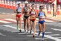 (From front to back) Italy's Antonella Palmisano, China's Yang Jiayu, Brazil's Erica Rocha De Sena and Colombia's Sandra Lorena Arenas compete in the women's 20km race walk final during the Tokyo 2020 Olympic Games at the Sapporo Odori Park in Sapporo on August 6, 2021. (Photo by Charly TRIBALLEAU / AFP)<!-- NICAID(14855792) -->