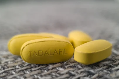 Tadalafil pill medication udes to treat erectile dysfunction and benign prostatic hyperplasia and pulmonary arterial hypertension taken by mouth<!-- NICAID(16003953) -->