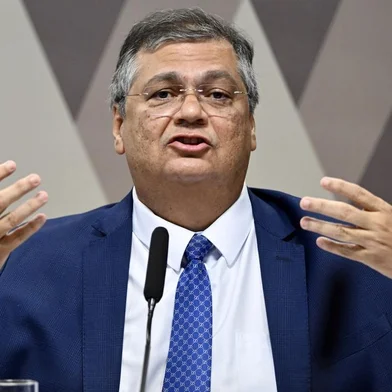 Brazil's Justice Minister, Flavio Dino, who was nominated by President Lula da Silva to the Brazil High Court, speaks during a hearing before the Senate Constitution and Justice Committee in Brasilia on December 13, 2023. (Photo by EVARISTO SA / AFP)Editoria: POLLocal: BrasíliaIndexador: EVARISTO SASecao: governmentFonte: AFPFotógrafo: STF<!-- NICAID(15624370) -->