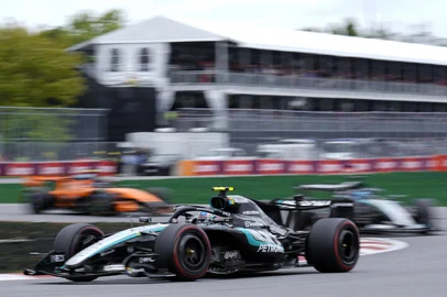 Mercedes' Italian driver Kimi Antonelli races ahead of teammate Mercedes' British driver George Russell and McLaren's British driver Lando Norris during the 2026 Formula 1 Grand Prix du Canada at Circuit Gilles-Villeneuve in Montreal, Canada, on May 24, 2026. (Photo by Geoff Robins / AFP)<!-- NICAID(16297545) -->