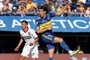 Boca Juniors' Uruguayan midfielder Edinson Cavani (R) looks at the ball after a header next to Newell's Old Boys' midfielder Ivan Gomez during their Argentine Professional Football League Tournament 2023 match at La Bombonera stadium in Buenos Aires on November 12, 2023. (Photo by ALEJANDRO PAGNI / AFP)Editoria: SPOLocal: Buenos AiresIndexador: ALEJANDRO PAGNISecao: soccerFonte: AFPFotógrafo: STR<!-- NICAID(15626135) -->