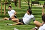 Players with Uruguay s Olympic football team including Liverpool player Luis Suarez L and Napoli player Edinson Cavani exercise inside the Olympic athletes village in Stratford east London on July 30 2012 AFP PHOTO POOL JOHN STILLWELL luiz suarez,cavani,londres,olimpíada