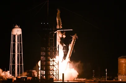 A SpaceX Falcon 9 rocket with the Crew Dragon Resilience capsule, carrying the crew of the Polaris Dawn Mission, lifts off from Launch Complex 39A at Kennedy Space Center in Cape Canaveral, Florida, on September 10, 2024. (Photo by CHANDAN KHANNA / AFP)<!-- NICAID(15862056) -->