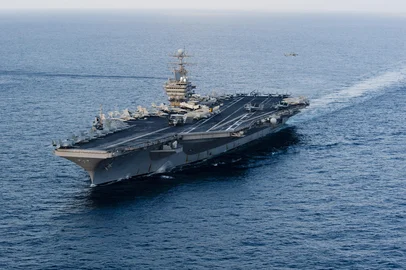 This January 19, 2012 image provided by the US Navy, shows the Nimitz-class aircraft carrier USS Abraham Lincoln (CVN 72) transiting the Arabian Sea. The Lincoln has passed through the Strait of Hormuz and is now in the Gulf, the Pentagon said January 23, 2012 after Tehran threatened to close the strategic shipping route.    AFP PHOTO/HANDOUT/US NAVY /MCS3 Will Tyndall     = RESTRICTED TO EDITORIAL USE - MANDATORY CREDIT " AFP PHOTO / US NAVY " - NO MARKETING NO ADVERTISING CAMPAIGNS - DISTRIBUTED AS A SERVICE TO CLIENTS =<!-- NICAID(7883743) -->