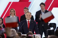 Karol Nawrocki, candidate for the 2025 Polish presidential election ed by Poland's right-wing Law and Justice (PiS) party, addresses ers as exit polls were announced during their election night event at the Mala Warszawa Theatre in Warsaw, Poland, during the second round of the presidential elections on June 1, 2025. The centrist and nationalist candidates in Poland's presidential election on June 1 both claimed victory after an exit poll indicated they were neck and neck. (Photo by Wojtek RADWANSKI / AFP)<!-- NICAID(16050565) -->