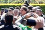 Brazil's President Jair Bolsonaro speaks to supporters after leading a caravan of more than 1000 bikers to celebrate Mother's Day in Brasilia on May 9, 2021. (Photo by EVARISTO SA / AFP)<!-- NICAID(14778454) -->