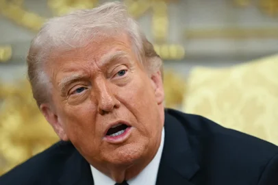 US President Donald Trump speaks during a meeting with German Chancellor Friedrich Merz in the Oval Office of the White House in Washington, DC on March 3, 2026. Chancellor Merz is the first European leader to visit President Trump since the United States and Israel launched their war against Iran. (Photo by ANDREW CABALLERO-REYNOLDS / AFP)<!-- NICAID(16237371) -->