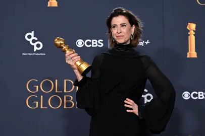 Brazilian actress Fernanda Torres poses with the Best Performance by a Female Actor in a Motion Picture  Drama award for "I'm Still Here" in the press room during the 82nd annual Golden Globe Awards at the Beverly Hilton hotel in Beverly Hills, California, on January 5, 2025. (Photo by Robyn Beck / AFP)<!-- NICAID(15947946) -->