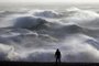 A person looks out towards the waves crashing on the shore in Newhaven on January 2, 2024, as Storm Henk was set to bring strong winds and heavy rain across much of southern England. (Photo by ADRIAN DENNIS / AFP)Editoria: WEALocal: NewhavenIndexador: ADRIAN DENNISSecao: global changeFonte: AFPFotógrafo: STF<!-- NICAID(15640078) -->