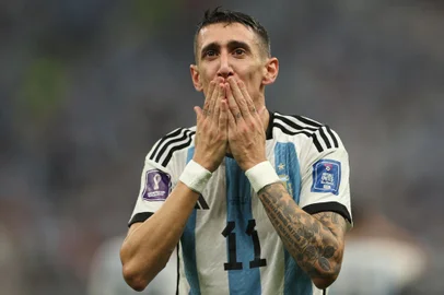 Argentina's midfielder #11 Angel Di Maria celebrates scoring his team's second goal during the Qatar 2022 World Cup final football match between Argentina and France at Lusail Stadium in Lusail, north of Doha on December 18, 2022. (Photo by Adrian DENNIS / AFP)Editoria: SPOLocal: DohaIndexador: ADRIAN DENNISSecao: soccerFonte: AFPFotógrafo: STF<!-- NICAID(15298475) -->