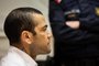 Brazilian footballer Dani Alves looks on at the start of his trial at the High Court of Justice of Catalonia in Barcelona, on February 5, 2024. Brazilian footballer Dani Alves, a former star at Barca and PSG, goes on trial in Barcelona accused of raping a woman in a local nightclub. Prosecutors are asking for a nine-year prison sentence, followed by 10 years of conditional liberty. They are also asking he pay 150,000 euros ($162,000) in compensation to the woman. (Photo by Jordi BORRAS / POOL / AFP)Editoria: SPOLocal: BarcelonaIndexador: JORDI BORRASSecao: soccerFonte: POOLFotógrafo: STR<!-- NICAID(15669827) -->