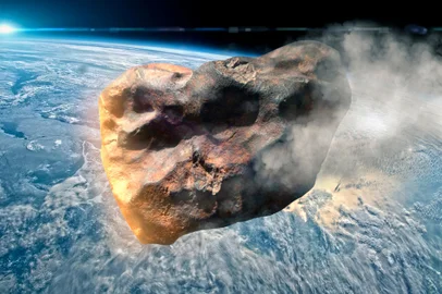 Imagem que ilustra um asteroide se aproximando da Terra<!-- NICAID(15412242) -->