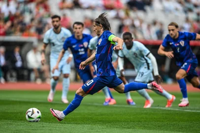 PATRICIA DE MELO MOREIRA / AFP Modric, futebol, Croácia