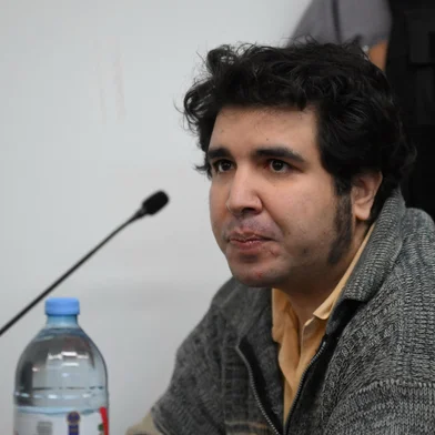 Fernando Sabag Montiel, among those accused over the failed 2022 assassination attempt against then-vice president Cristina Fernandez de Kirchner, attends the verdict hearing at the Comodoro Py courthouse in Buenos Aires on October 8, 2025. Argentina's judiciary is set to deliver a verdict on Wednesday against two people accused of a failed attempt to assassinate former president Cristina Kirchner, in a case that has shaken the South American country. (Photo by Luis ROBAYO / AFP)<!-- NICAID(16141857) -->