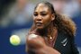 Serena Williams of the US hits a return to Magda Linette (out of frame) of Poland during their 2018 US Open Women's Singles match at the USTA Billie Jean King National Tennis Center in New York on August 27, 2018.  / AFP PHOTO / Don EMMERT