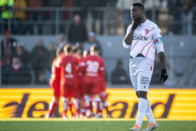 FC Sion's Italian forward Mario Balotelli looks on after his team received a first goal during the Swiss Super League football match FC Sion against FC Lugano at the Tourbillon stadium in Sion, on March 5, 2023. (Photo by Fabrice COFFRINI / AFP)Editoria: SPOLocal: SionIndexador: FABRICE COFFRINISecao: soccerFonte: AFPFotógrafo: STF<!-- NICAID(15648643) -->