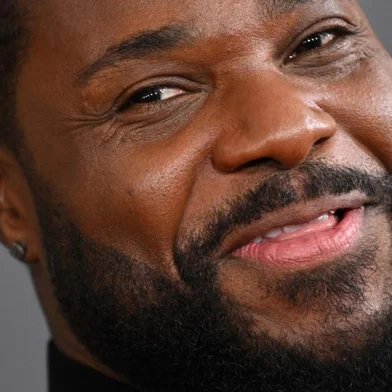 (FILES) US actor Malcolm-Jamal Warner arrives for the 65th Annual Grammy Awards at the Crypto.com Arena in Los Angeles on February 5, 2023. Warner, who played the son in the smash-hit sitcom "The Cosby Show," has drowned in Costa Rica, authorities in the country said on July 21, 2025. He was 54. Warner played the loveable Theo Huxtable for all eight seasons of the show, helmed by disgraced comic actor Bill Cosby. (Photo by Robyn BECK / AFP)<!-- NICAID(16085134) -->