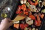 Baked vegetables and fruits on a baking sheet. Vegan theme. AppeFonte: 264060138<!-- NICAID(15466454) -->