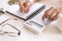 Elderly women's hands count expenses, plan a budget the concept of retirement, savings, old age.Old women's hands count expenses, plan a budget the concept of retirement, savings, old ageFonte: 398018214<!-- NICAID(15533012) -->