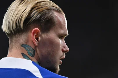 (FILES) Chelsea's Ukrainian midfielder #10 Mykhailo Mudryk looks on during the English Premier League football match between Chelsea and Everton at Stamford Bridge in London on April 15, 2024. Chelsea forward Mykhailo Mudryk has failed a doping test, the Premier League club said on December 17, 2024, as reports stated the Ukraine international has been provisionally suspended. (Photo by Glyn KIRK / AFP) / RESTRICTED TO EDITORIAL USE. No use with unauthorized audio, video, data, fixture lists, club/league logos or 'live' services. Online in-match use limited to 120 images. An additional 40 images may be used in extra time. No video emulation. Social media in-match use limited to 120 images. An additional 40 images may be used in extra time. No use in betting publications, games or single club/league/player publications. / <!-- NICAID(15937017) -->