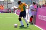 Brazil's Ricardo Alves (L) runs with the ball as Japan's Roberto Izumi Sasaki looks for the ball during the preliminary round group A football 5-a-side match between Japan and Brazil during the Tokyo 2020 Paralympic Games at the Aomi Urban Sports Park in Tokyo on August 30, 2021. (Photo by Behrouz MEHRI / AFP), ricardinhoEditoria: SPOLocal: TokyoIndexador: BEHROUZ MEHRISecao: sports eventFonte: AFPFotógrafo: STF<!-- NICAID(14875784) -->