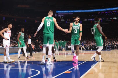 NEW YORK, NY - OCTOBER 25: Kristaps Porzingis #8 high fives Jayson Tatum #0 of the Boston Celtics during the game against the New York Knicks on October 25, 2023 at Madison Square Garden in New York City, New York. NOTE TO USER: User expressly acknowledges and agrees that, by downloading and or using this photograph, User is consenting to the terms and conditions of the Getty Images License Agreement. Mandatory Copyright Notice: Copyright 2023 NBAE   Nathaniel S. Butler/NBAE via Getty Images/AFP (Photo by Nathaniel S. Butler / NBAE / Getty Images / Getty Images via AFP)<!-- NICAID(15579559) -->