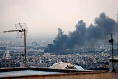 Smoke billows from an explosion in southwest Tehran on June 16, 2025. The Islamic Republic of Iran Broadcasting (IRIB) building was struck in an Israeli attack on June 16, cutting live coverage immediately. The blast occurred as the presenter was live on TV lambasting Israel before she was seen leaving the live broadcast, Iranian media reported, sharing a video of the incident. (Photo by ATTA KENARE / AFP)<!-- NICAID(16060807) -->