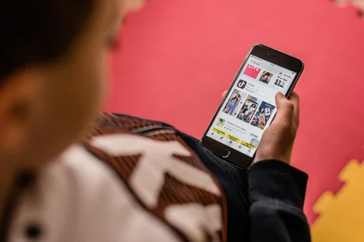 Orvieto, Italy, March 19 2020: teenager downloads tic toc on his smartphoneFonte: 332223949<!-- NICAID(16244073) -->