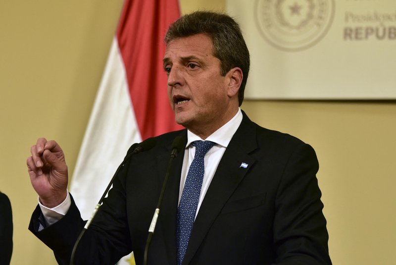 Argentine Economy Minister and presidential candidate Sergio Massa speaks during a press conference after a meeting with Paraguayan President Santiago Peña at the Mburuvicha Roga presidential residence in Asuncion on August 24, 2023. (Photo by NORBERTO DUARTE / AFP)<!-- NICAID(15523597) -->