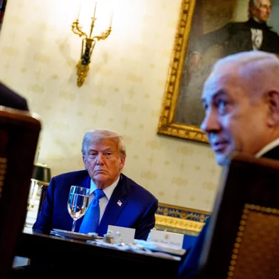WASHINGTON, DC - JULY 07: Israeli Prime Minister Benjamin Netanyahu, accompanied by U.S. President Donald Trump (L), speaks during a dinner in the Blue Room of the White House on July 07, 2025 in Washington, DC. Trump is hosting Netanyahu to discuss a potential ceasefire agreement to end the fighting in Gaza.   Andrew Harnik/Getty Images/AFP (Photo by Andrew Harnik / GETTY IMAGES NORTH AMERICA / Getty Images via AFP)<!-- NICAID(16075498) -->
