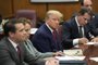 New York Grand Jury Votes To Indict Former President TrumpNEW YORK, NEW YORK - APRIL 04: Former U.S. President Donald Trump sits at the defense table with his defense team in a Manhattan court during his arraignment on April 4, 2023, in New York City. Trump was arraigned during his first court appearance today following an indictment by a grand jury that heard evidence about money paid to adult film star Stormy Daniels before the 2016 presidential election. With the indictment, Trump becomes the first former U.S. president in history to be charged with a criminal offense.   Seth Wenig-Pool/Getty Images/AFP (Photo by POOL / GETTY IMAGES NORTH AMERICA / Getty Images via AFP)Editoria: CLJLocal: New YorkIndexador: POOLSecao: justice and rightsFonte: GETTY IMAGES NORTH AMERICAFotógrafo: CONTRIBUTOR<!-- NICAID(15394293) -->